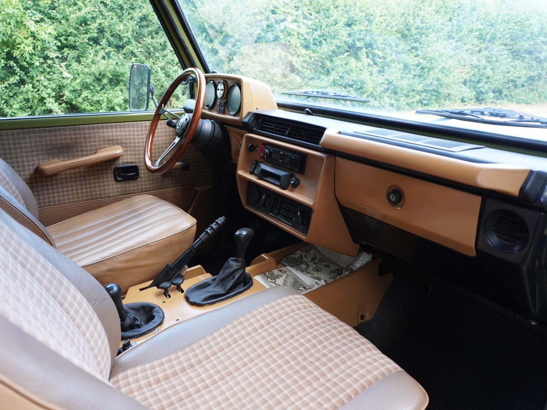 Cabin side view showing tan interior and door trim