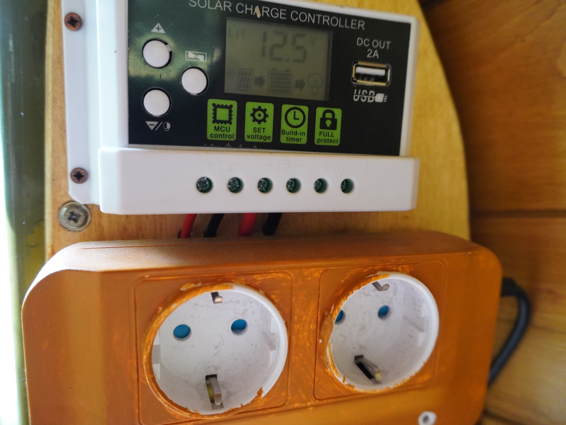 Solar charge controller and 220V shore-power sockets