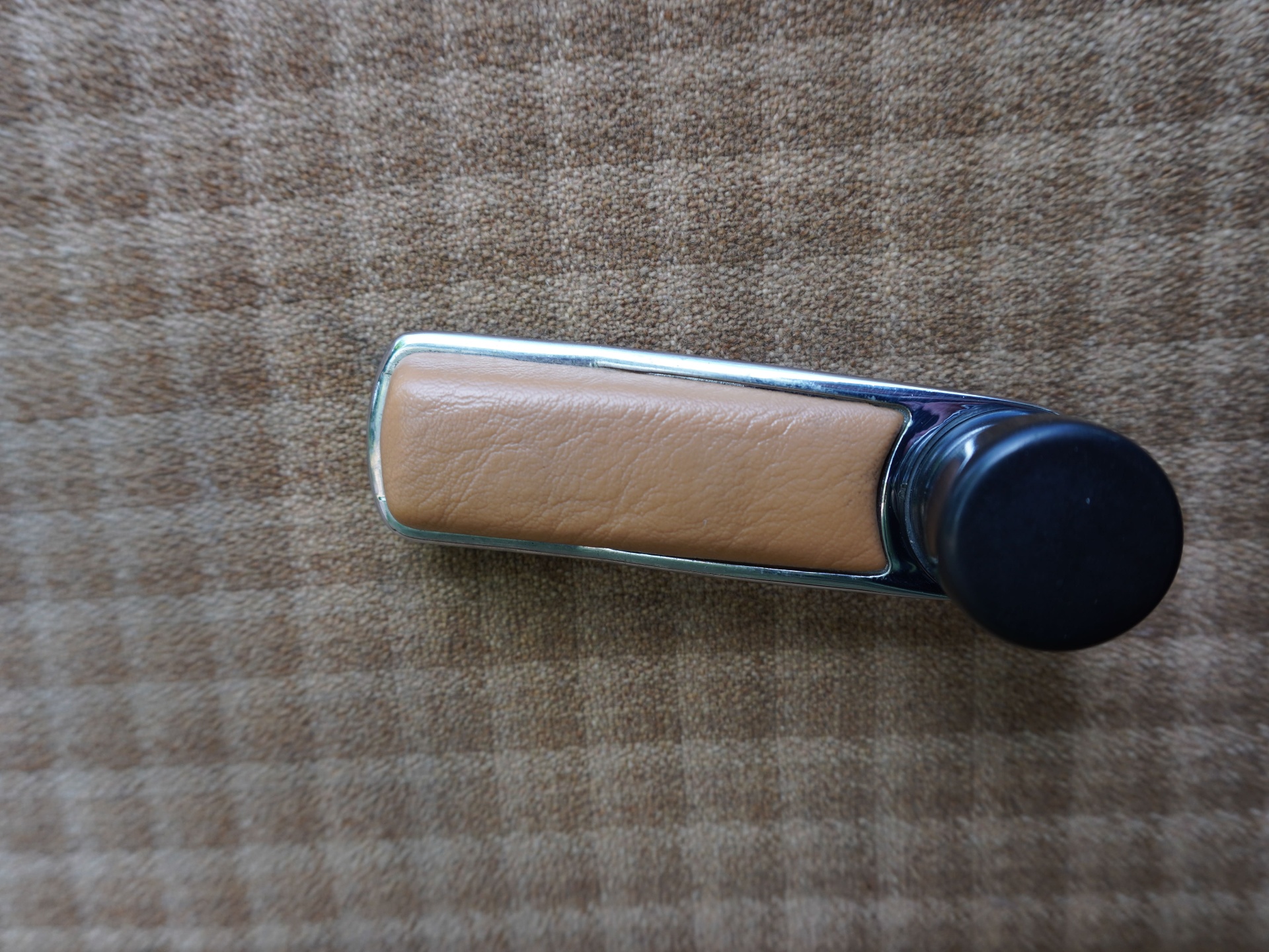 Chrome and tan leather window crank handle