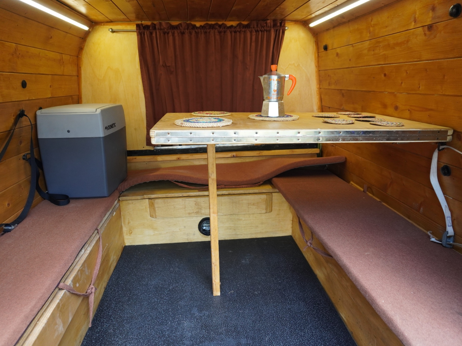 Camper dinette - facing benches, folding table, Dometic cool box