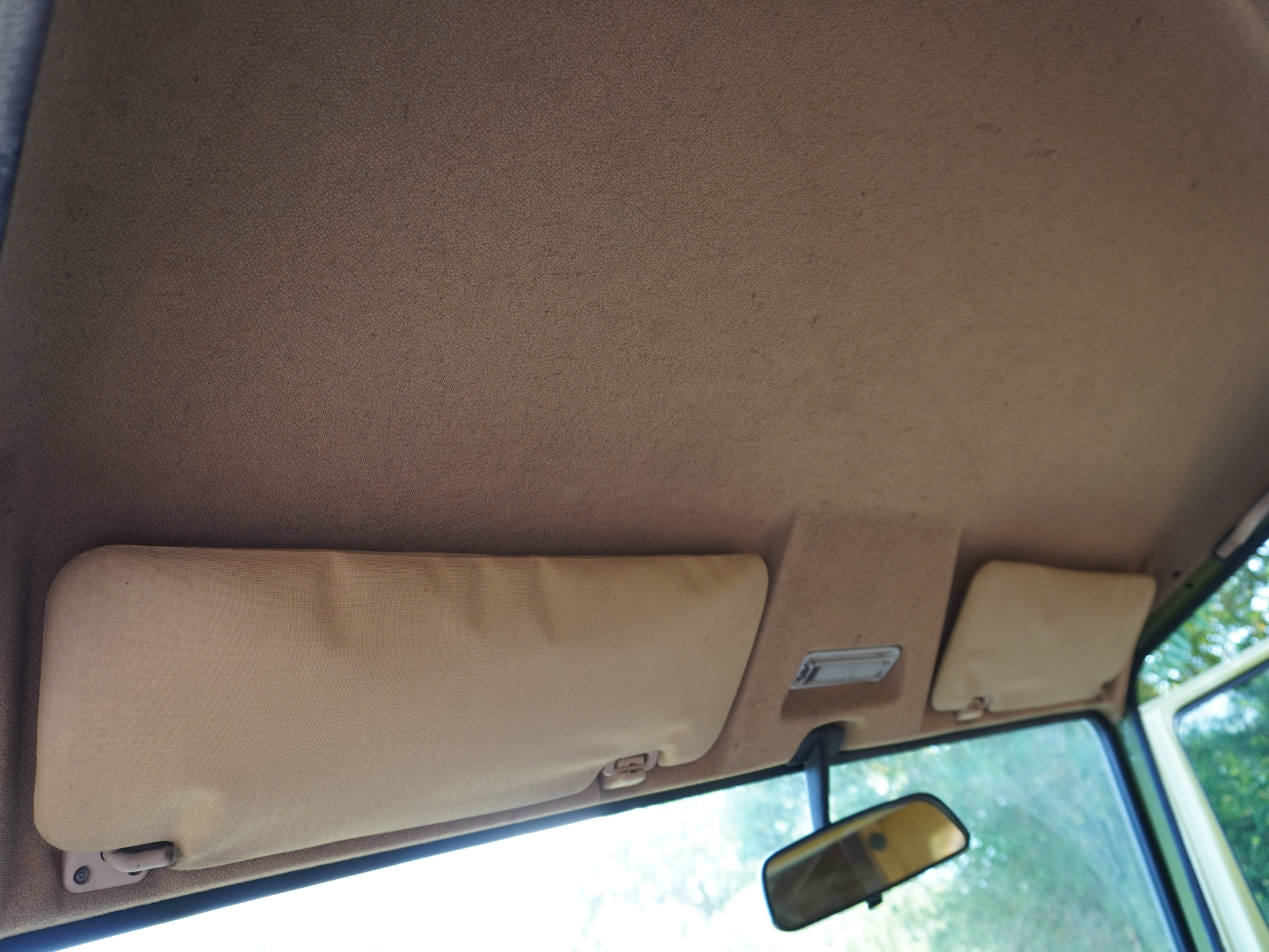 Tan headliner with original sun visors