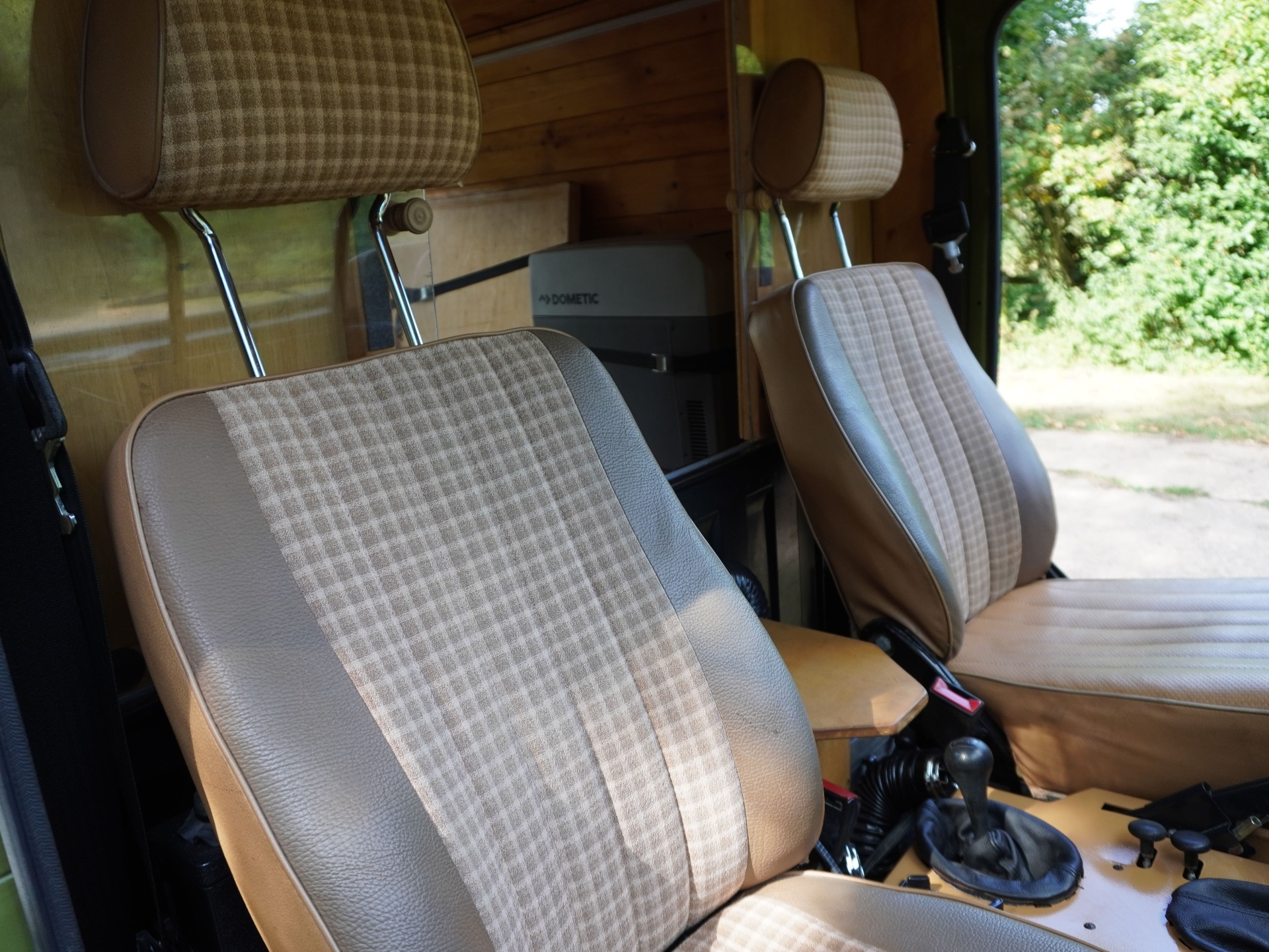 Front seats and camper partition view