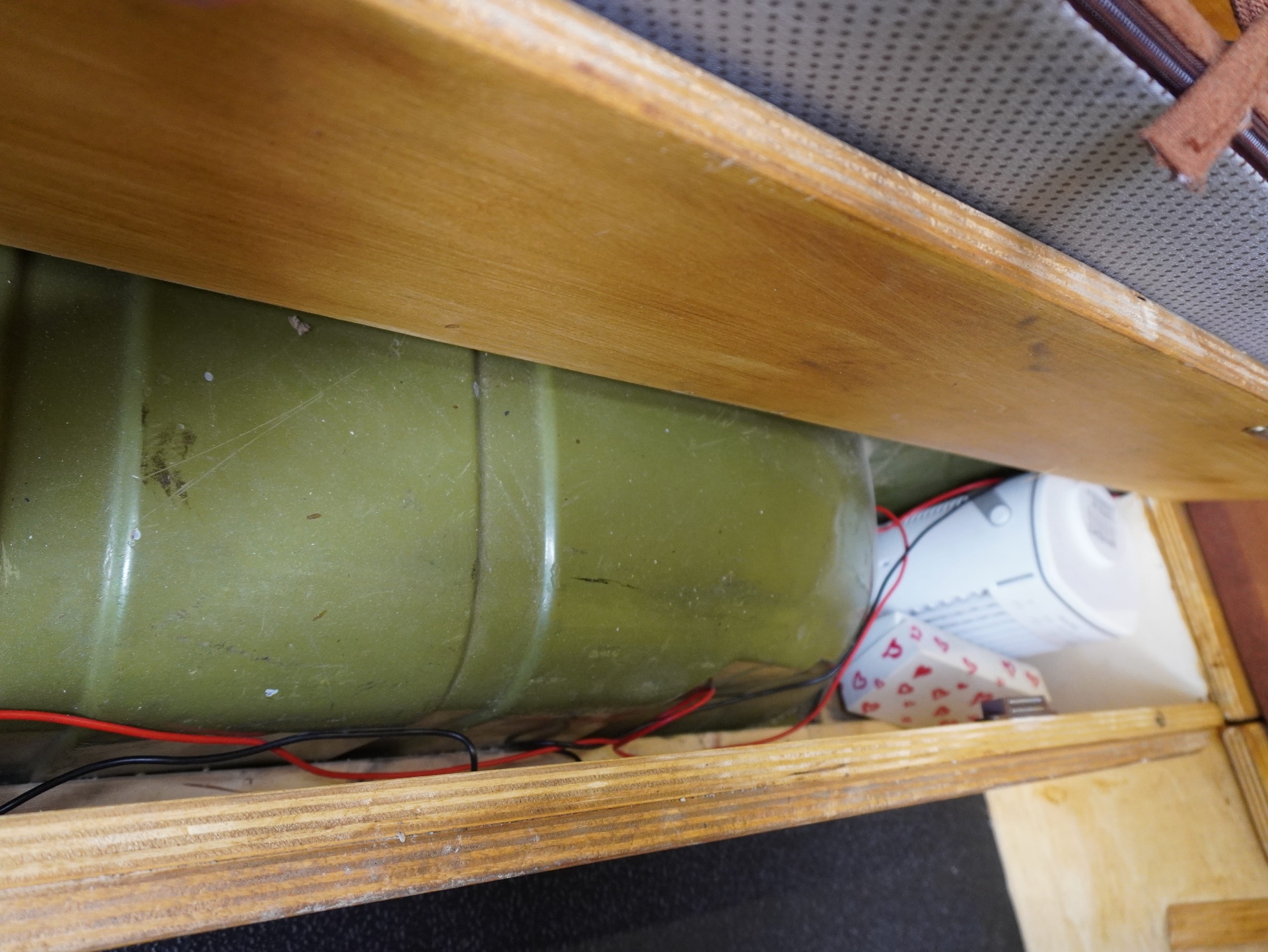 Onboard water tank in olive green, under-bench install